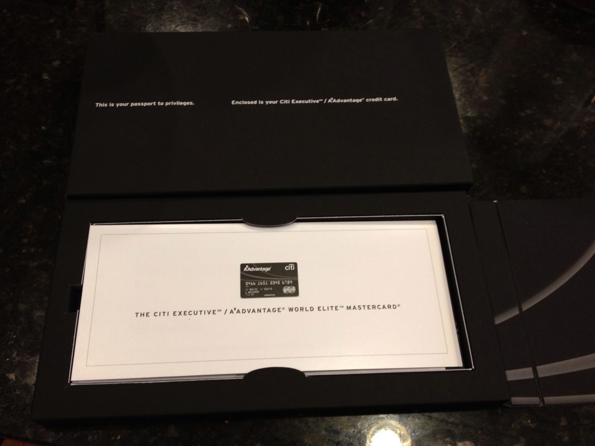 a black box with a white card inside