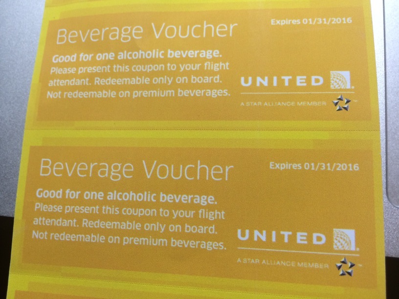 a yellow voucher with white text and words