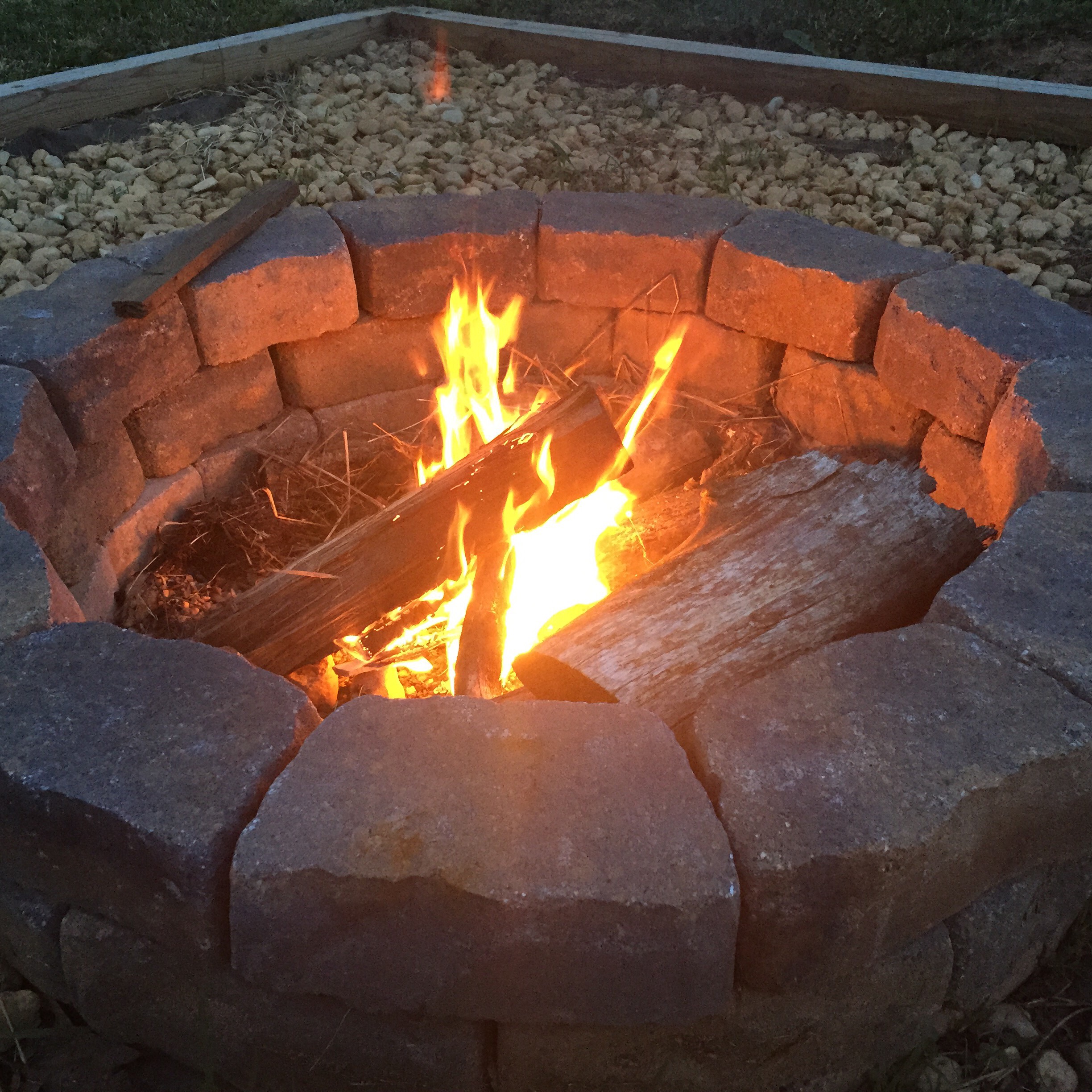 a fire pit with a fire in it