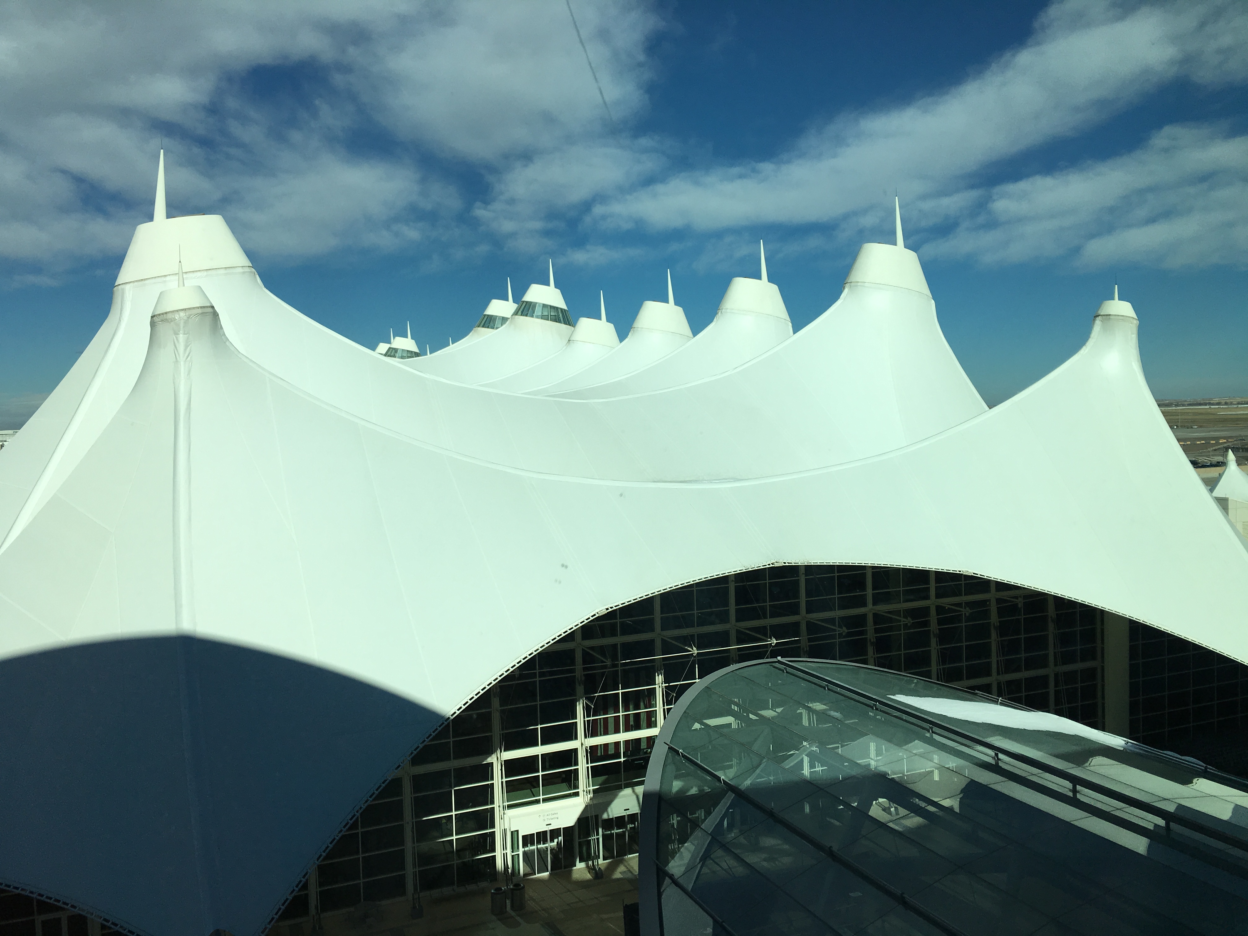 a white tent with a glass roof
