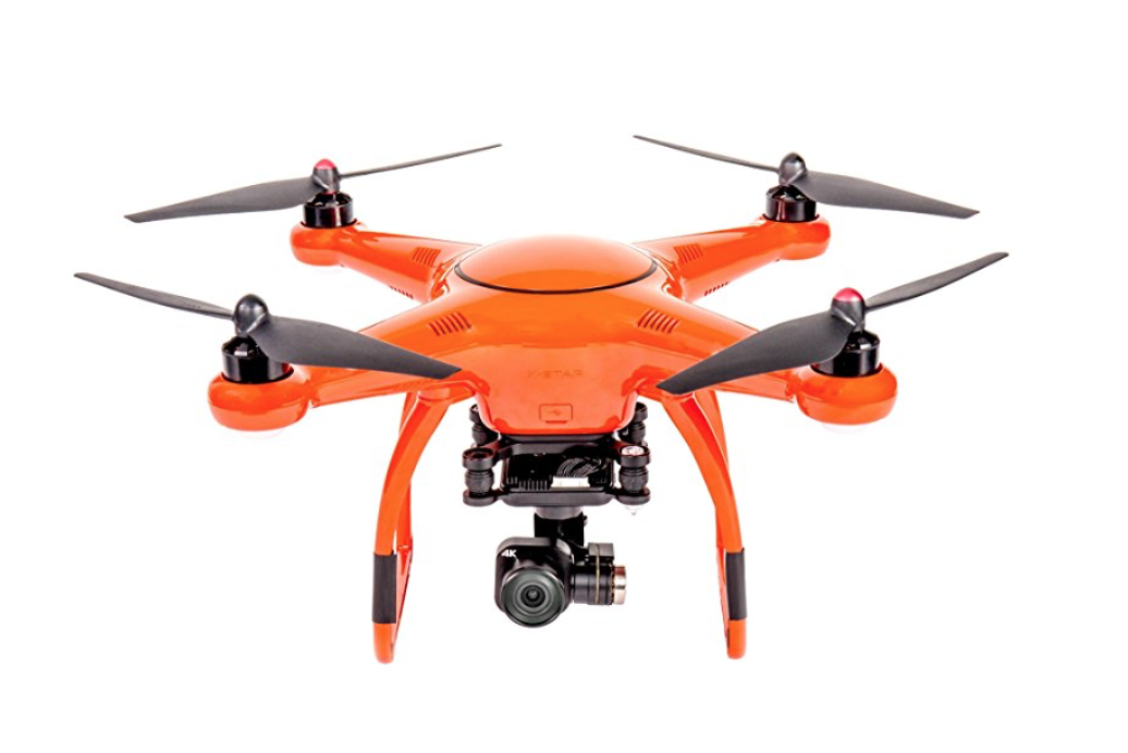 an orange drone with black propellers