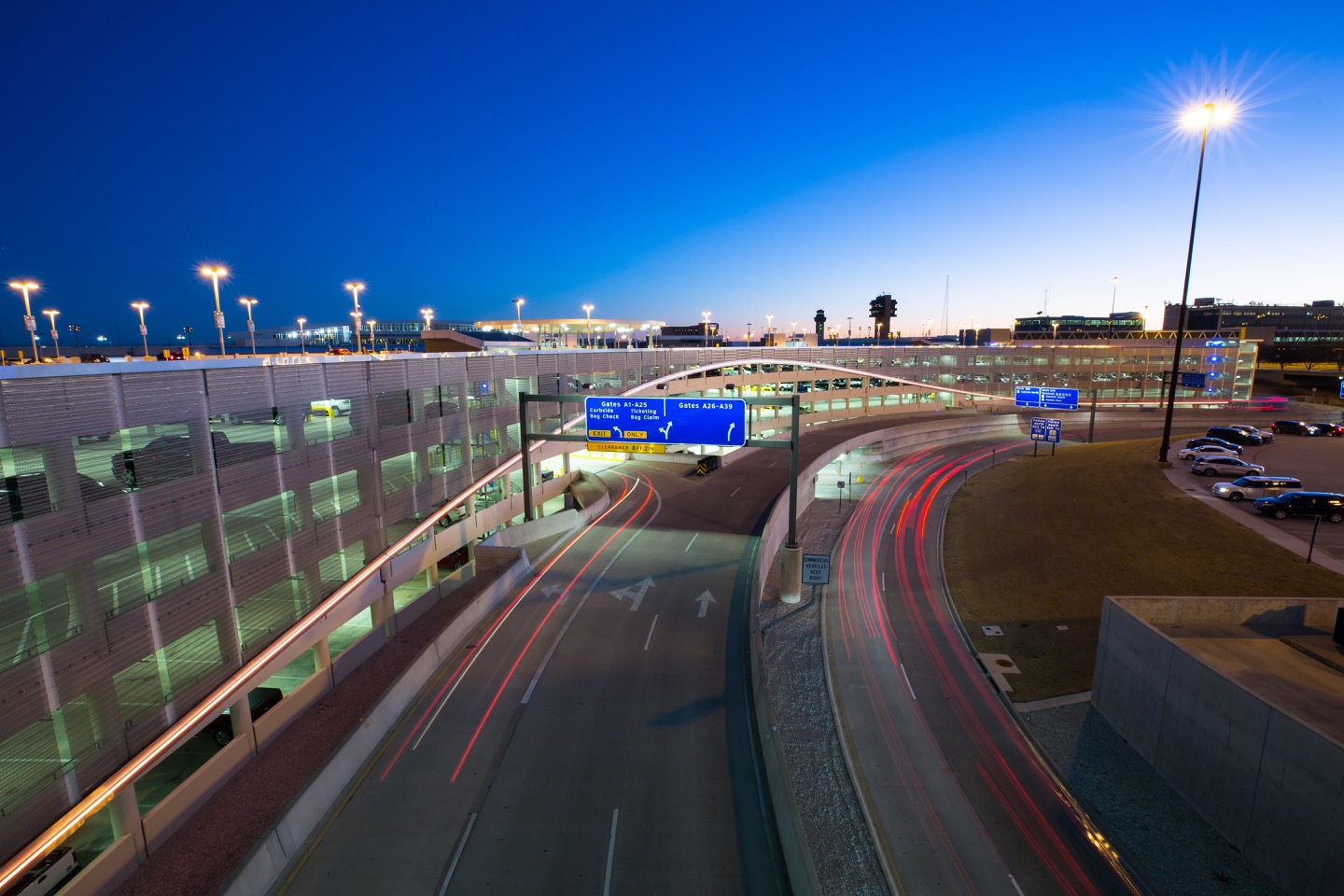 a freeway with a blue sign