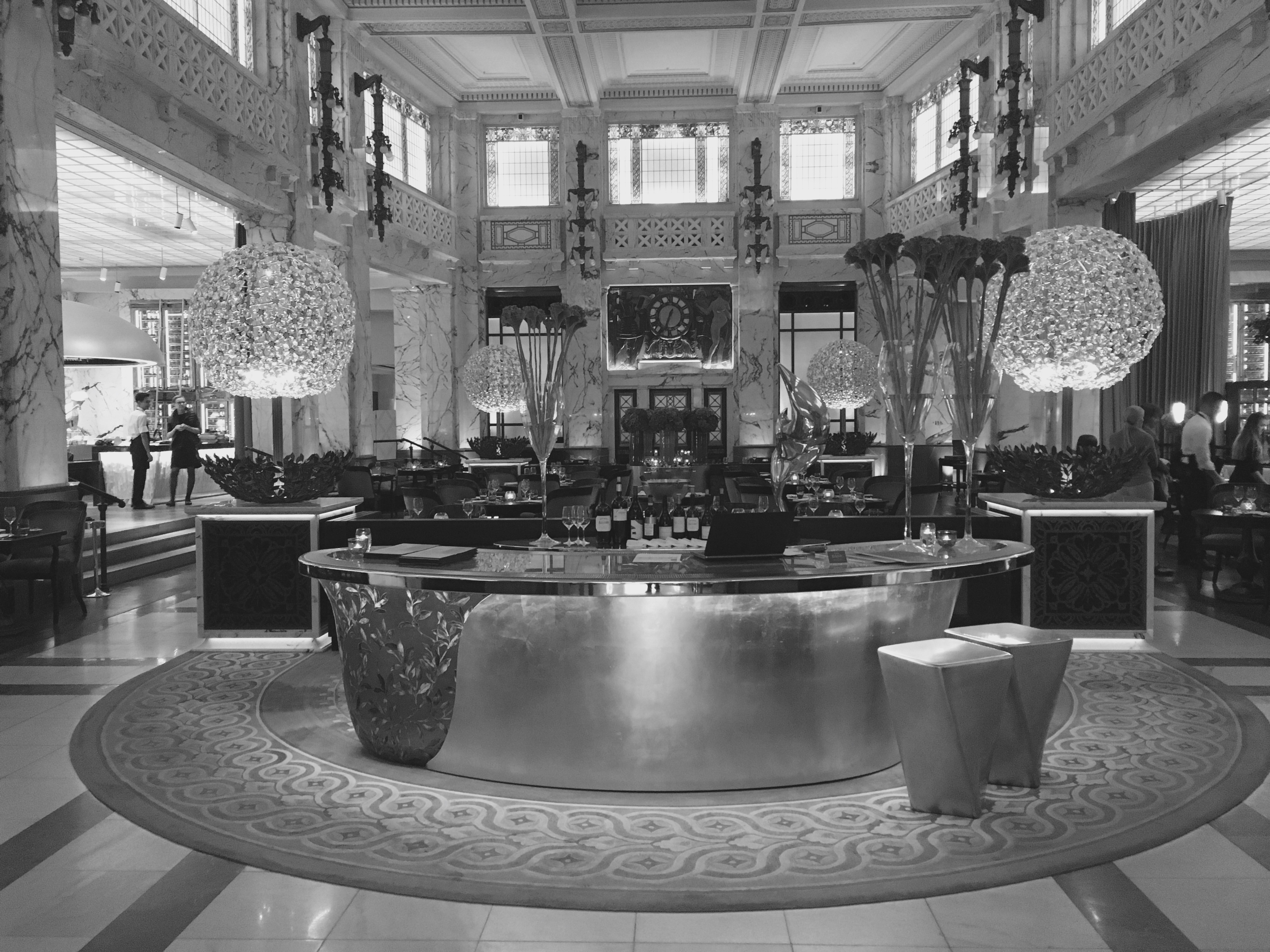a black and white photo of a lobby