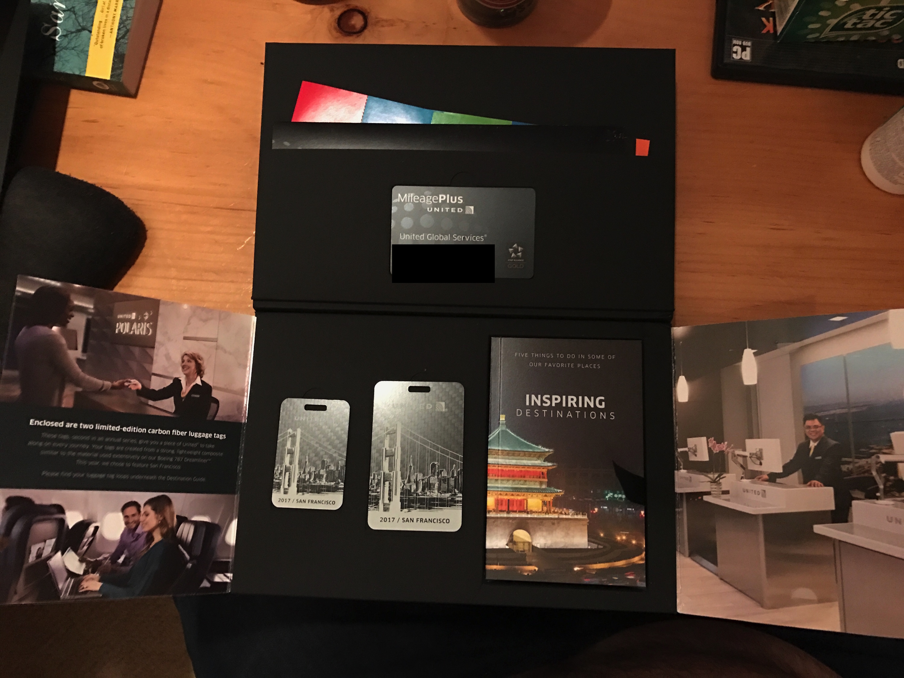 a black box with a group of brochures