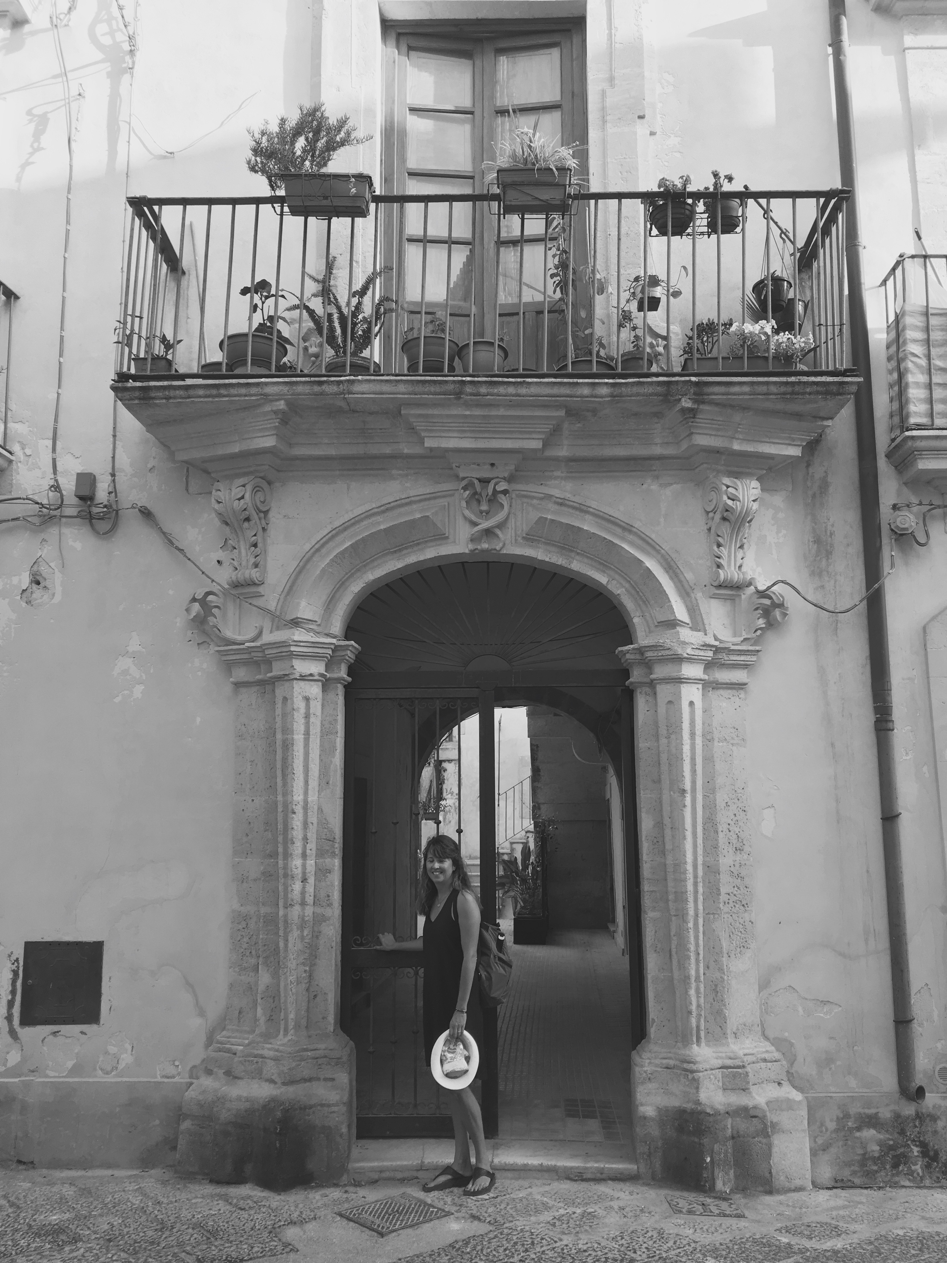 a woman standing in a doorway