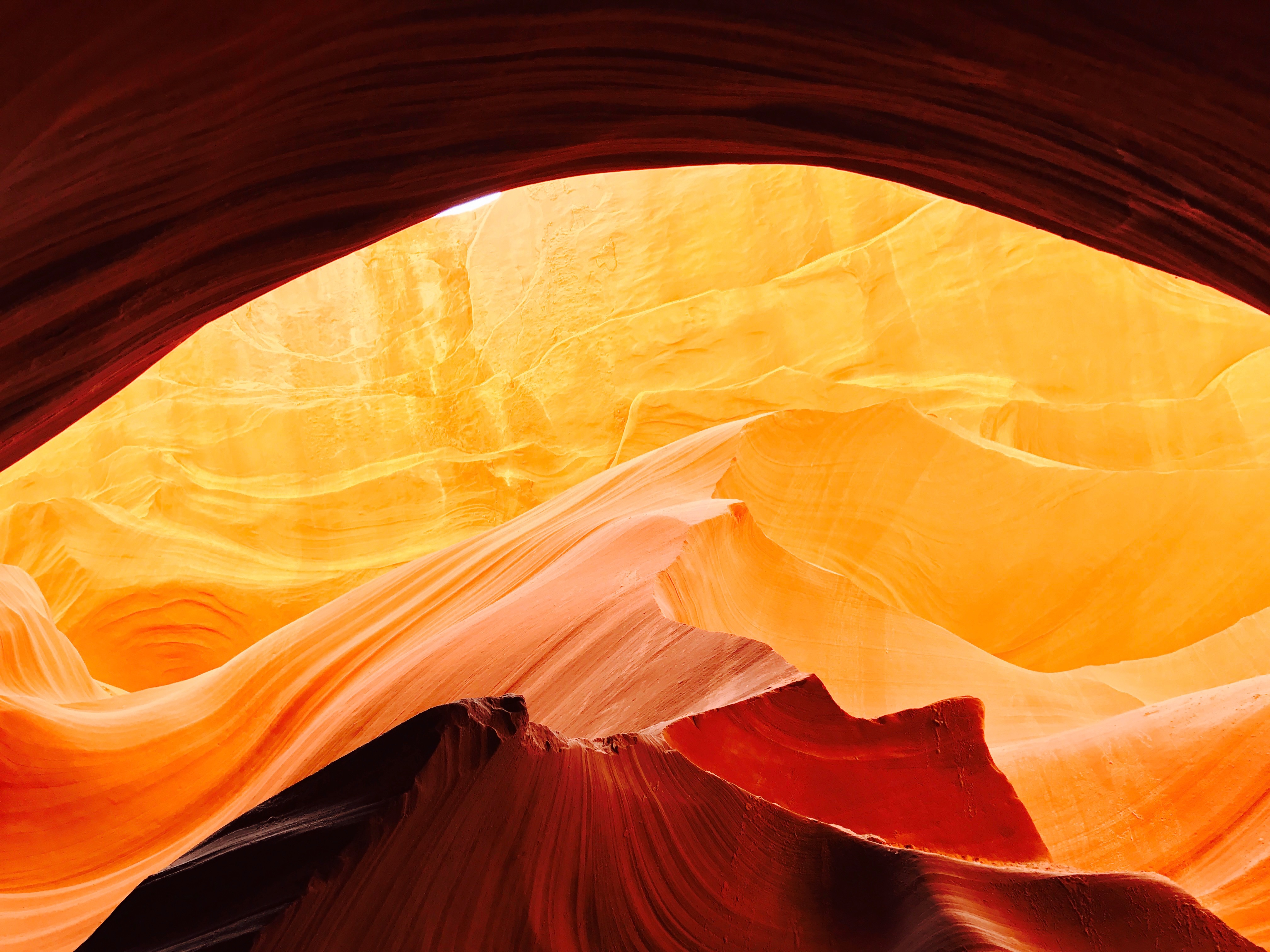a view of a canyon from a cave