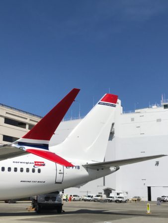 a plane with red and blue tail fin