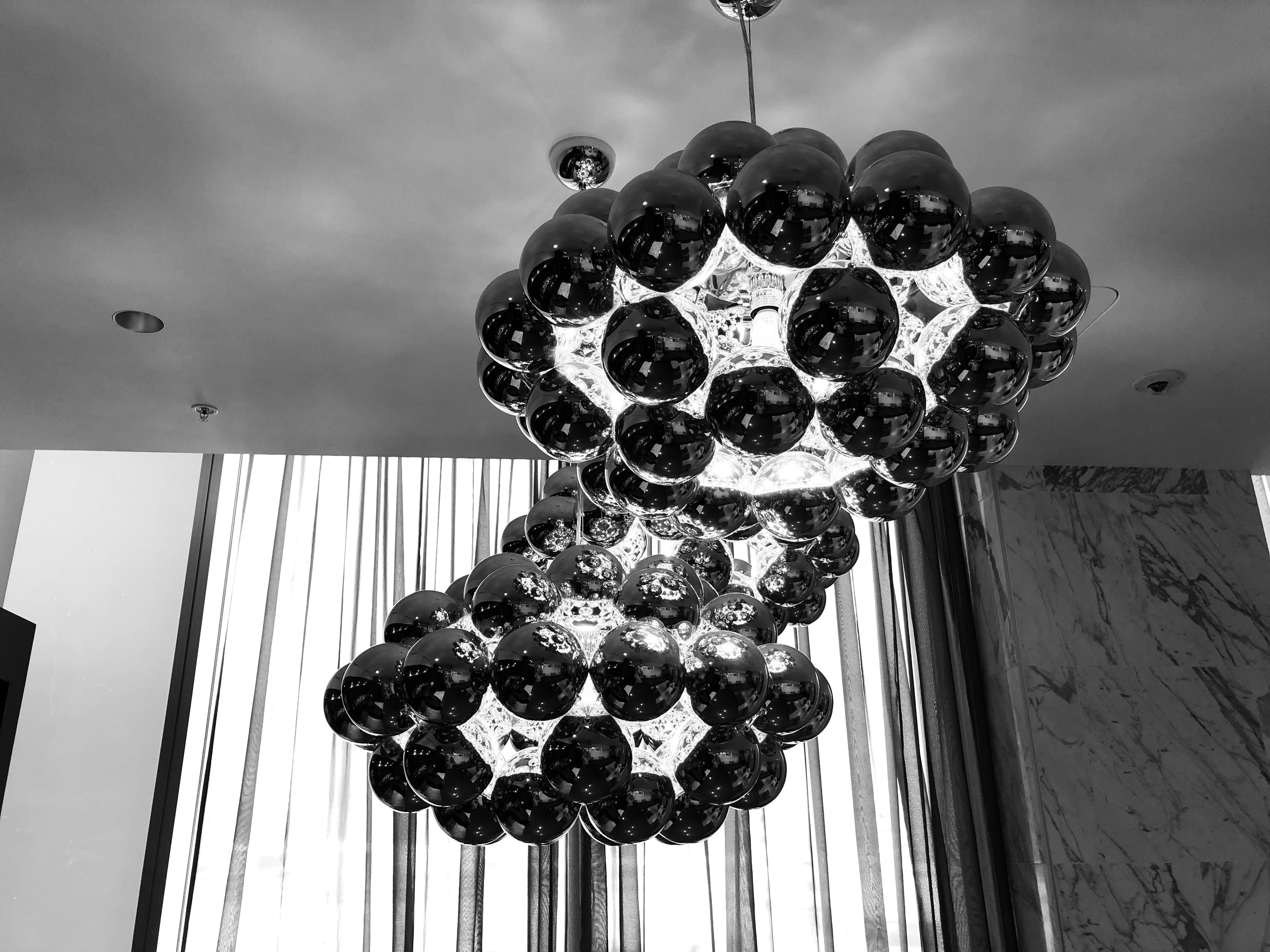 a chandelier with balls from the ceiling