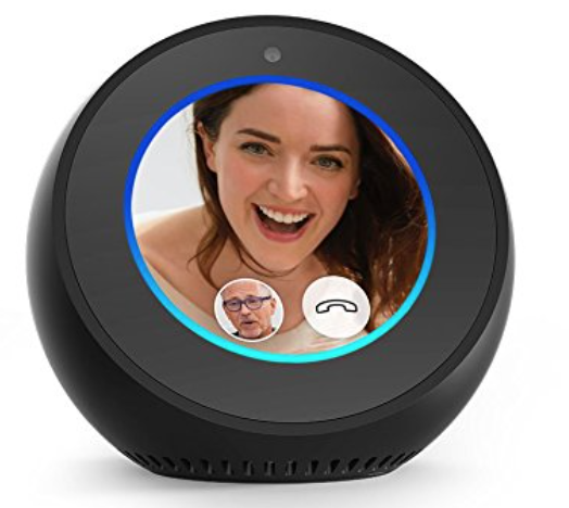 a round black device with a woman's face on it