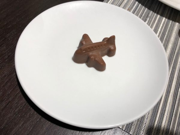 a chocolate airplane on a plate