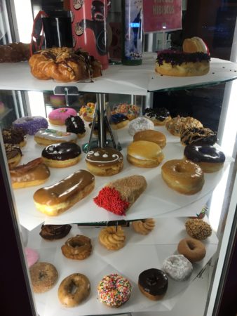 a display case full of donuts