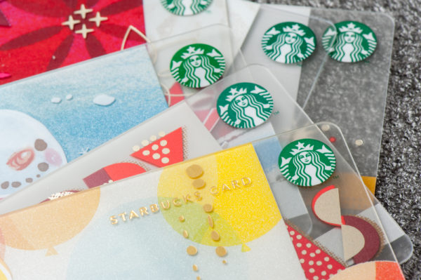 a group of starbucks cards