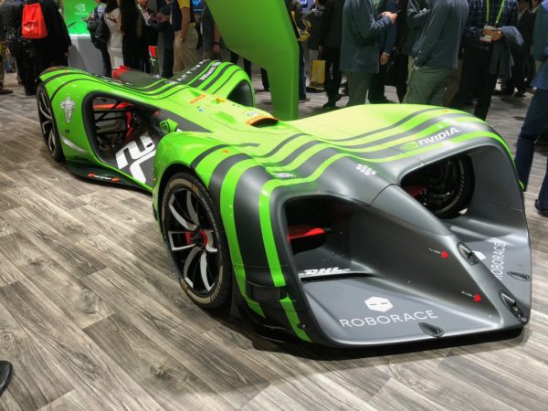 a green and black race car