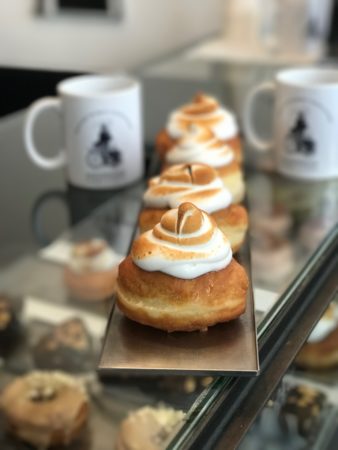 a row of pastries on a table