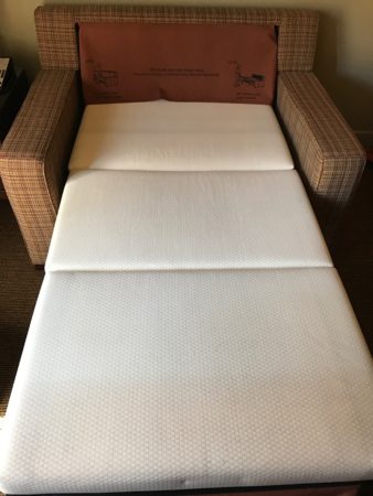 a chair with a box on it