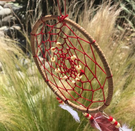 a close up of a dream catcher