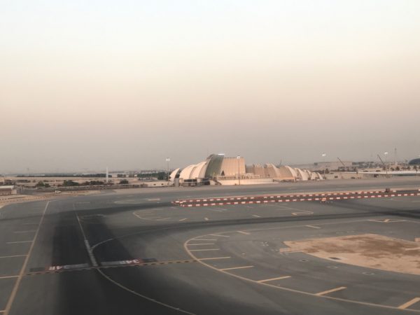 a runway with a building in the background