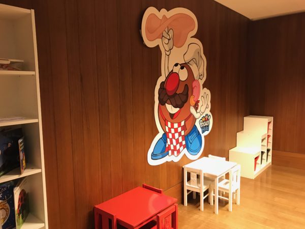 a room with a cartoon character on the wall