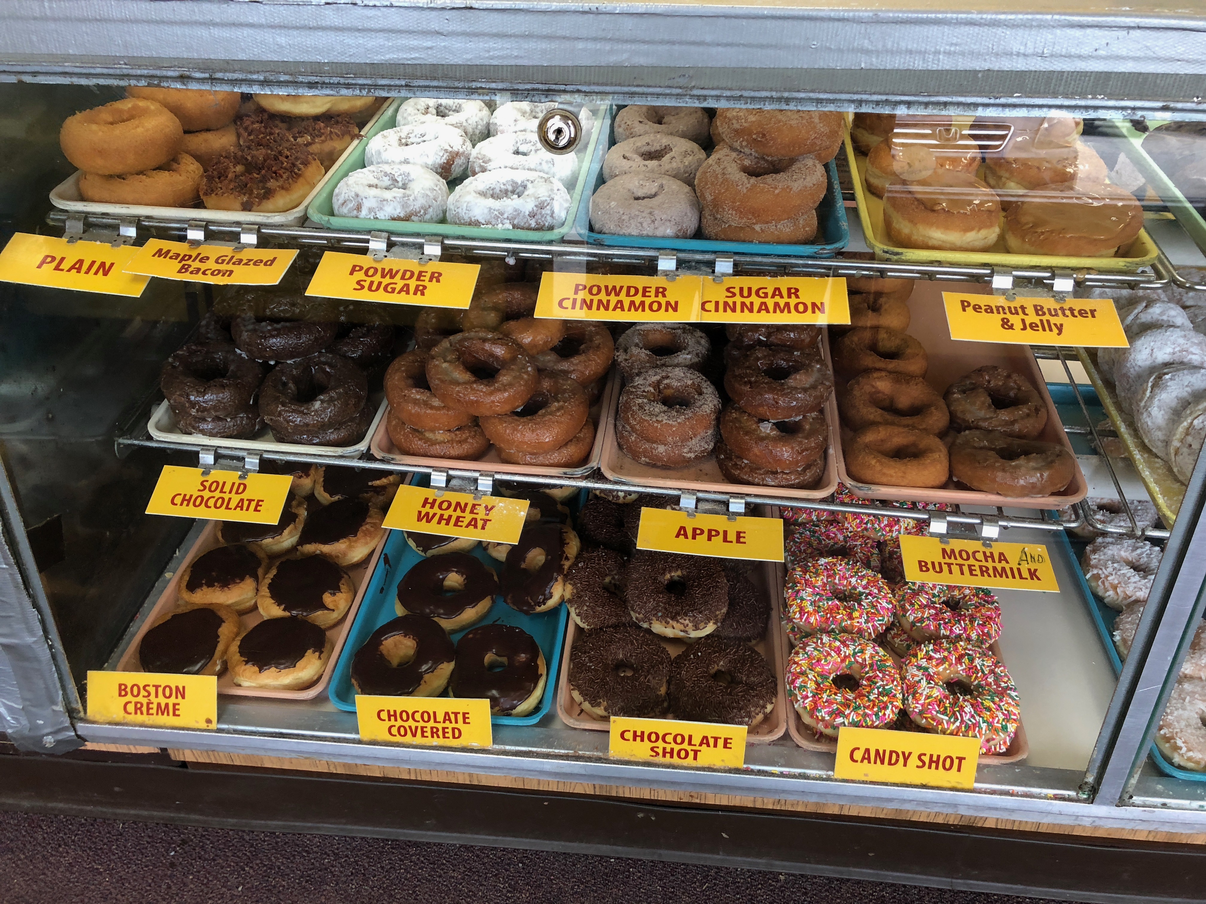 a display case of donuts