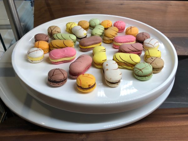 a plate of colorful cookies