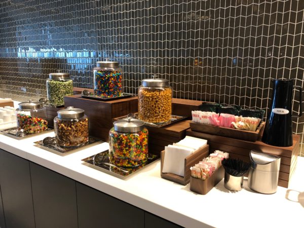 a group of containers of candy