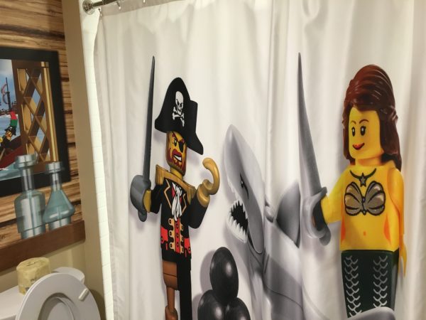 a shower curtain with a pirate theme