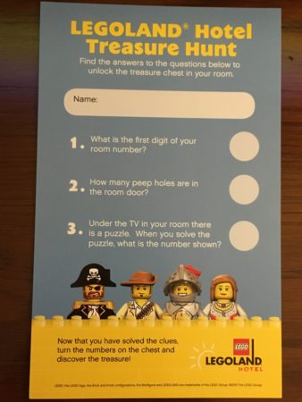 a blue card with a group of lego figures on it