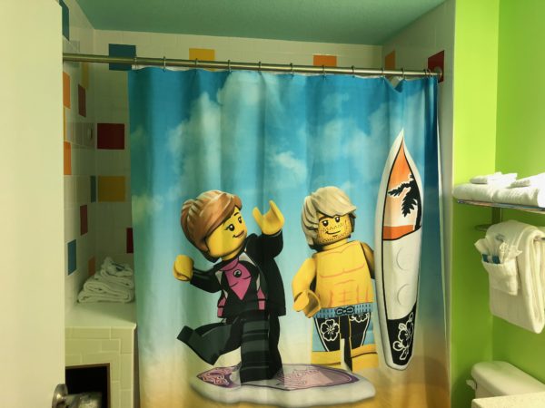 a shower curtain with a cartoon character on it