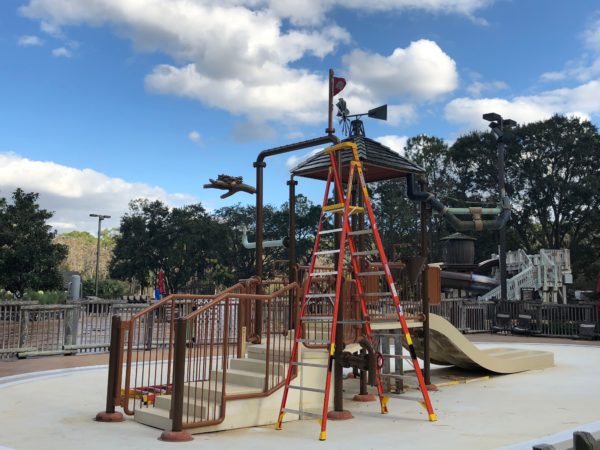a ladder next to a playground