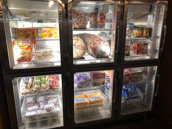 a refrigerator with food in it