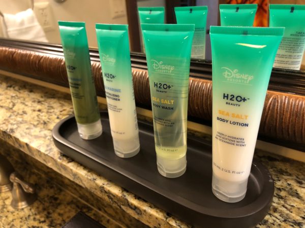 a group of body lotions on a counter