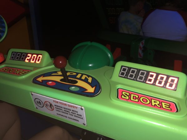 a green arcade game with numbers and buttons