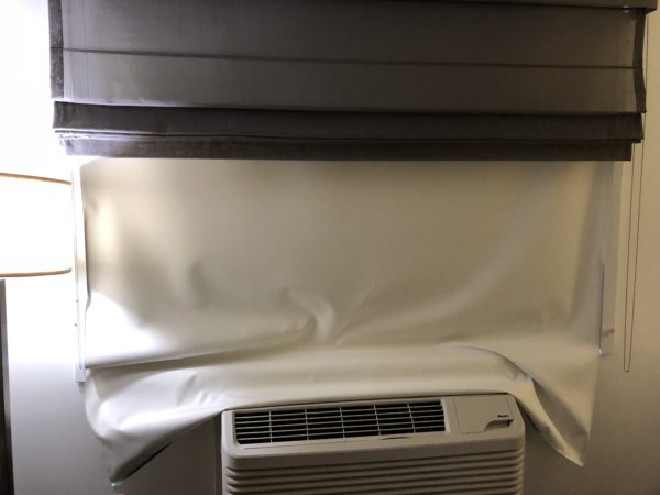 a white sheet covering a window