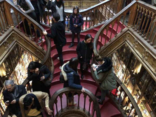 a group of people on a spiral staircase