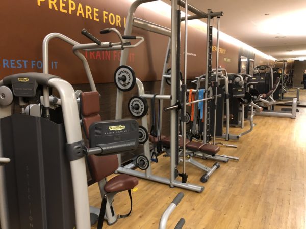 a row of exercise equipment