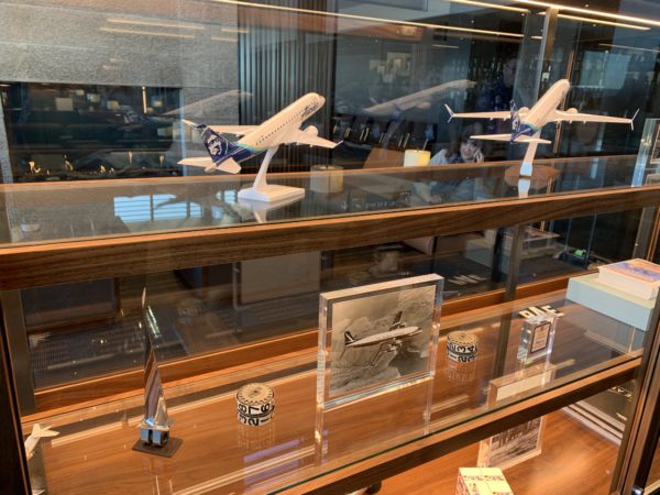 a glass case with airplanes on it