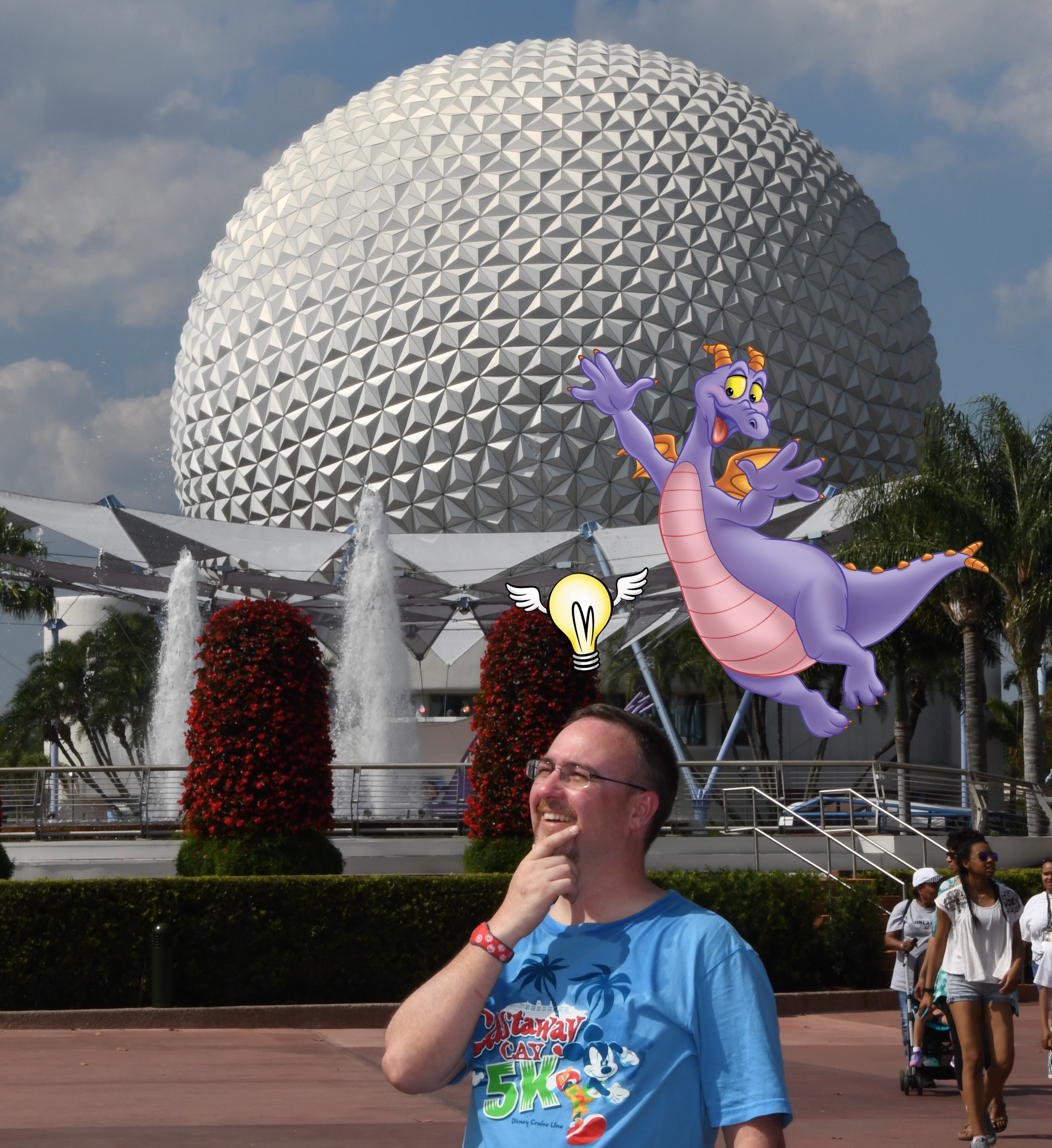 a man in front of a large white sphere