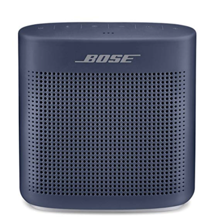 a blue speaker with a white background