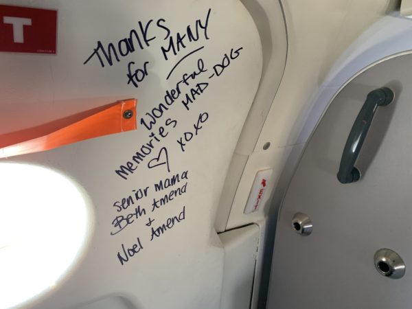 writing on a door of an airplane