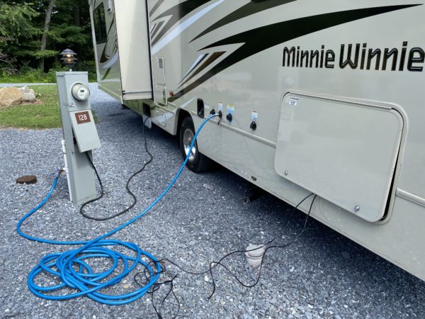 a blue hose connected to a vehicle
